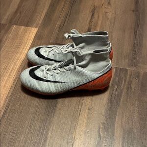 Nike High-Top Gray and Orange Cleats